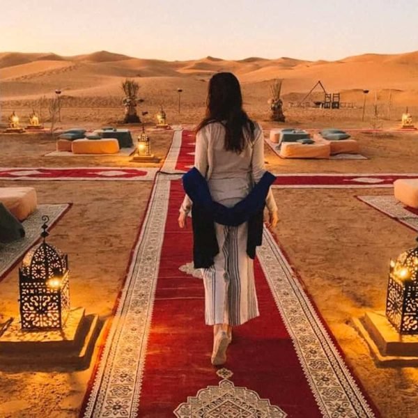 Great picture of a woman in the desert with camps