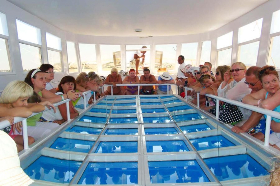 A wonderful picture of a group of tourists on a glass boat in Sharm El Sheikh
