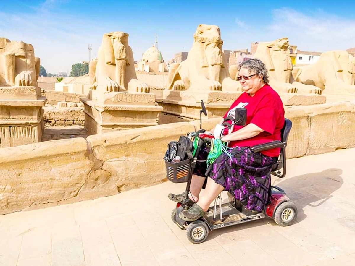 A wonderful picture of a tourist in Luxor in a wheelchair
