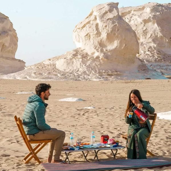 A wonderful shot of a couple enjoying breakfast in Bahariya Oasis