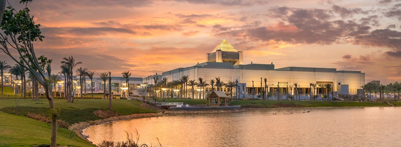 A wonderful shot of the Museum of Egyptian Civilization with the lake in front of it at sunset