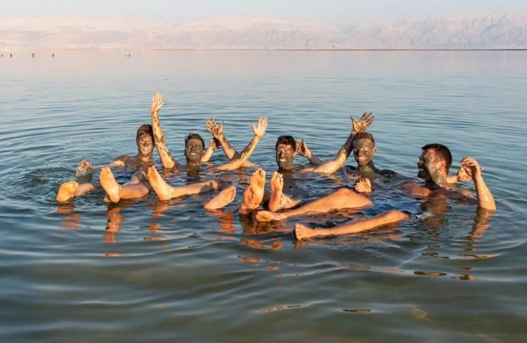 Great picture of a group of young people in the Dead Sea