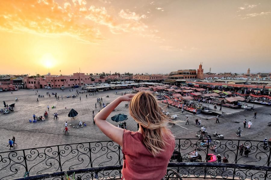 Great picture of a woman taking some photos in Marrakech