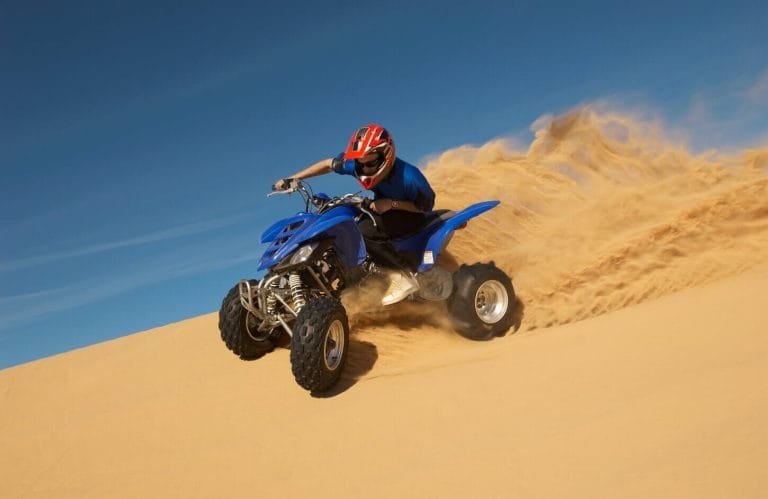 a wonderful shot of one of our visitors in the pyramids while riding a quad bike