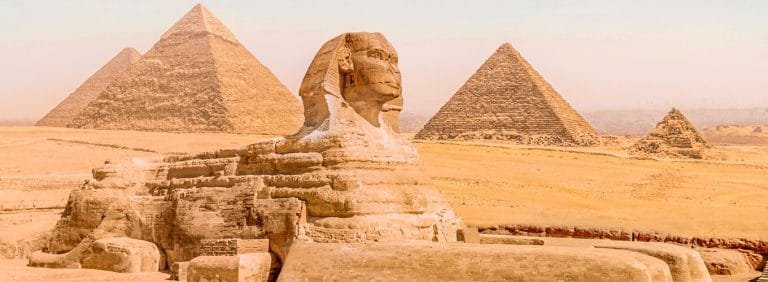 the great sphinx in front of the giza pyramid complex