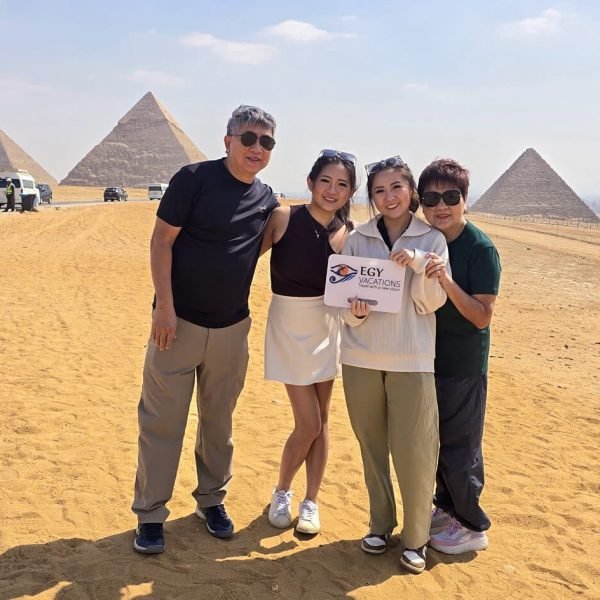 A wonderful photo of a family from one of our clients in front of the pyramids