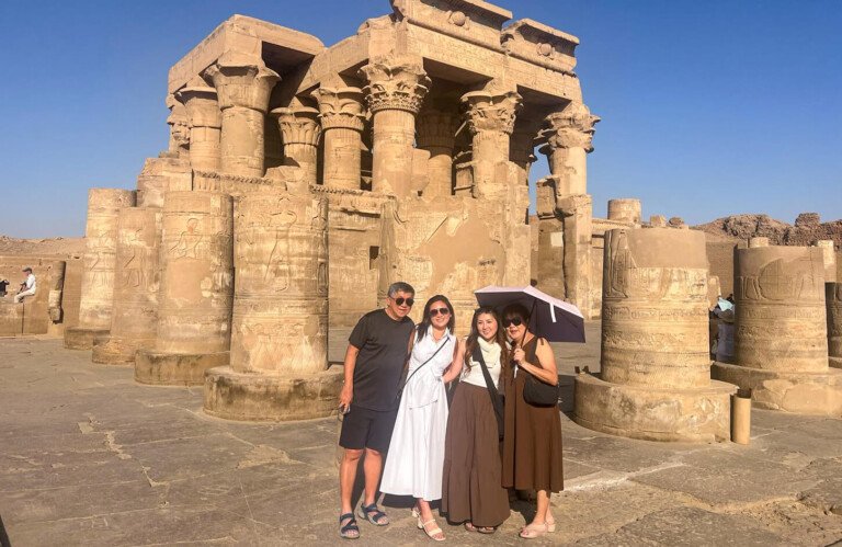amazing shot of a group of tourists at kom ombo temple