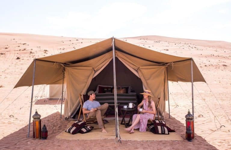a wonderful shot of a couple from wahiba sands