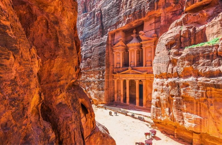 the iconic treasury of petra carved into rosered cliffs in jordan