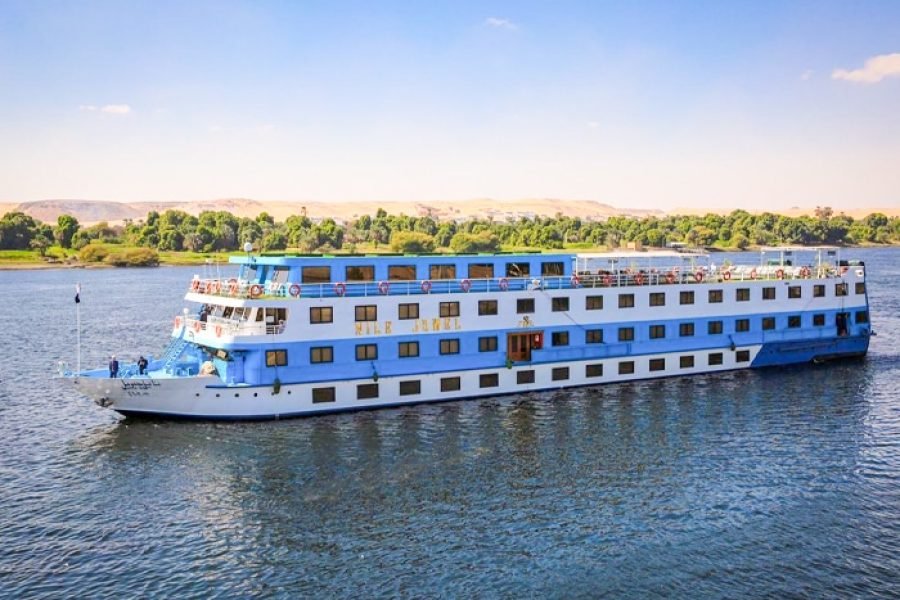 The luxurious MS Nile Jewel cruise ship sailing on the historic Nile River in Egypt.