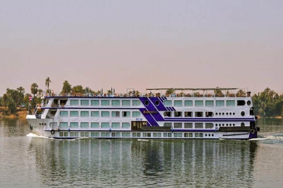 MS Radamis I cruise ship with a unique blue design, smoothly sailing the Nile River for a memorable Egypt river cruise.