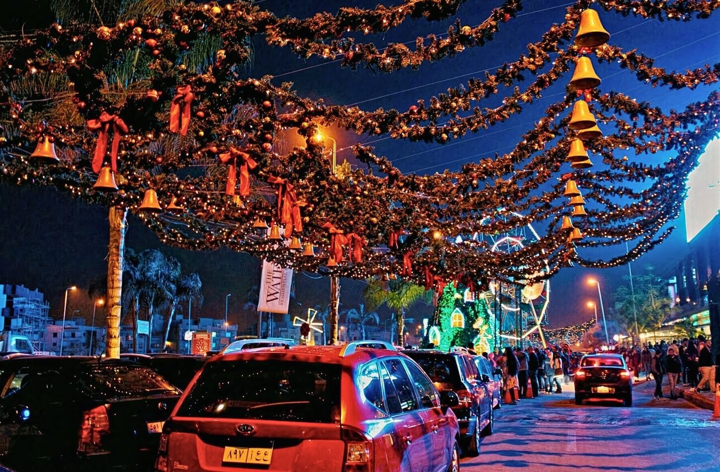 Christmas decorations on a street in Hurghada Egypt at night.