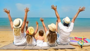 Happy family with children on a beach holiday in Türkiye