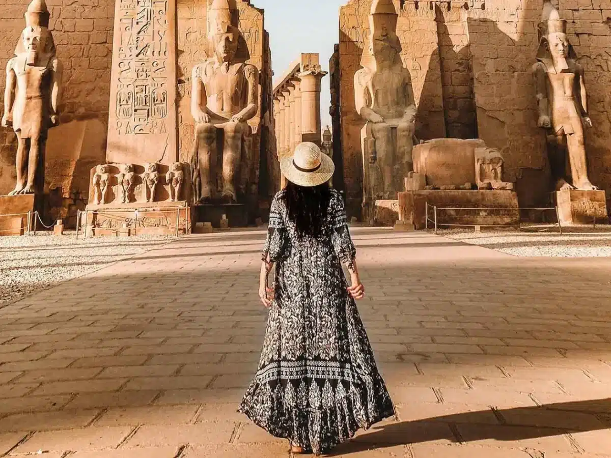 A stunning photo of a girl in front of Luxor Temple - Solo Travel to Egypt