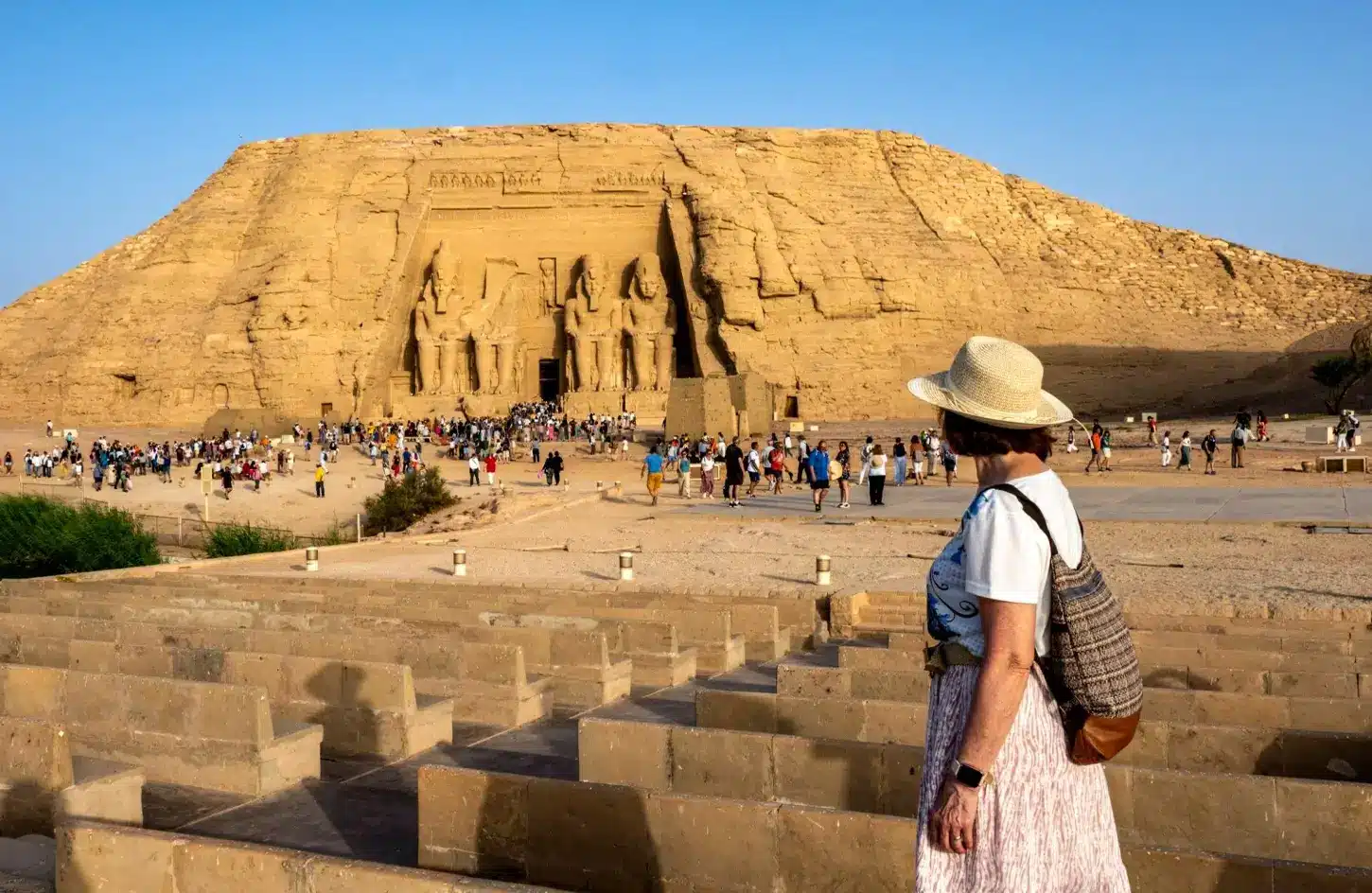 Tourist standing in front of Abu Simbel Temple in Aswan, Egypt - Egypt Travel Advice